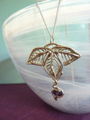 Abstract flower design with amethyst accent