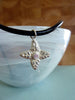 Four leaf flower with pale pink cubic zirconia